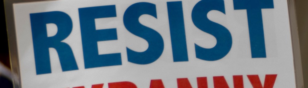 Sign saying RESIST TYRANNY